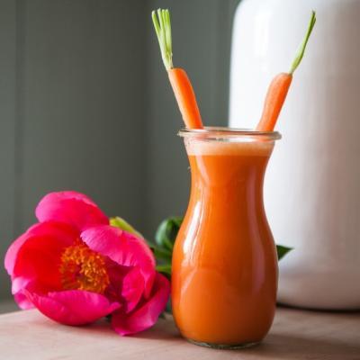 Carrot juice with turmeric, apple, orange and lemon