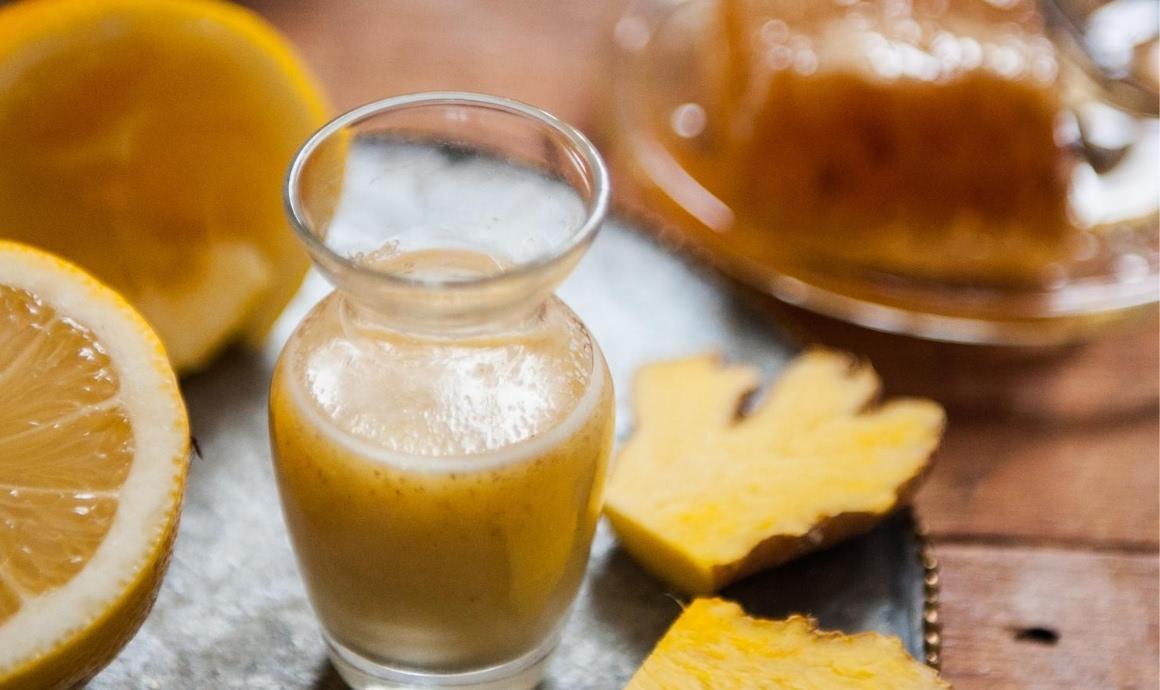 Prepare ginger shot recipes with ginger, lemon and honey in blender